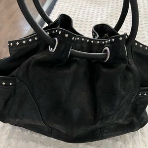 Black leather studded Cole Haan handbag and wallet